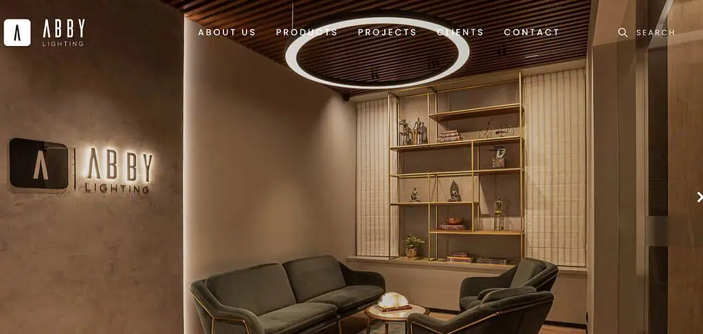Abby Lighting modern lounge area with stylish furniture.